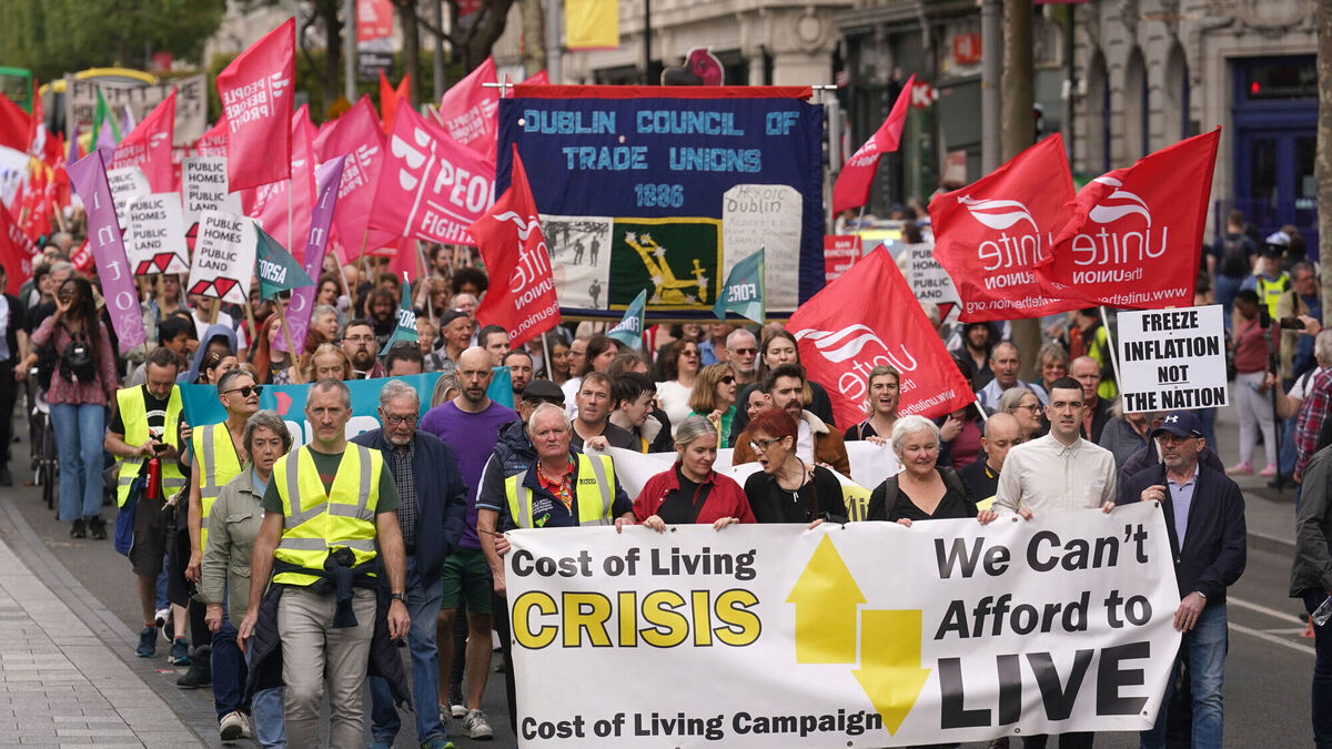 group of people at cost of living crisis march