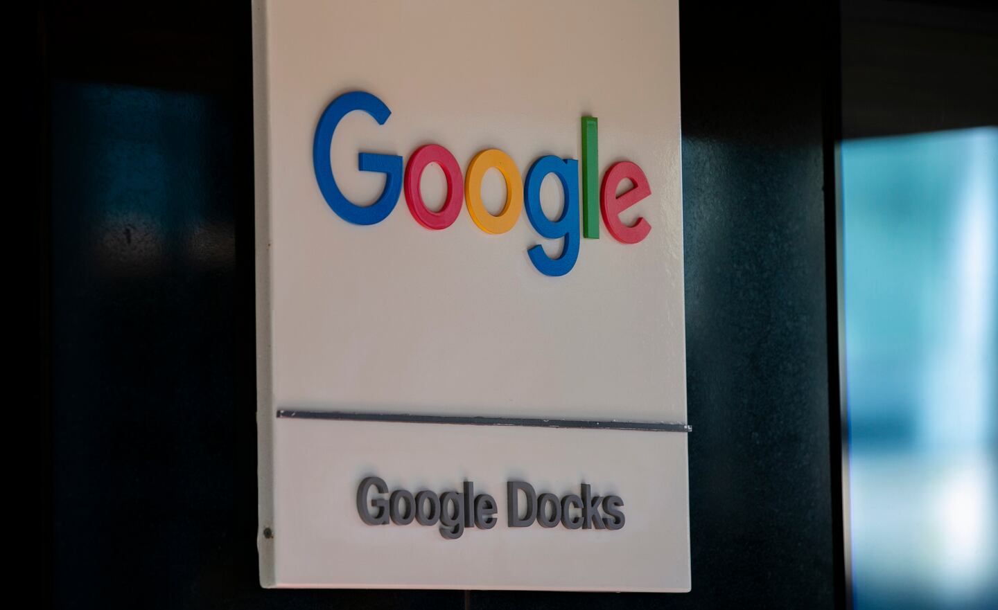 Google logo on a white background featuring the words Google Docks