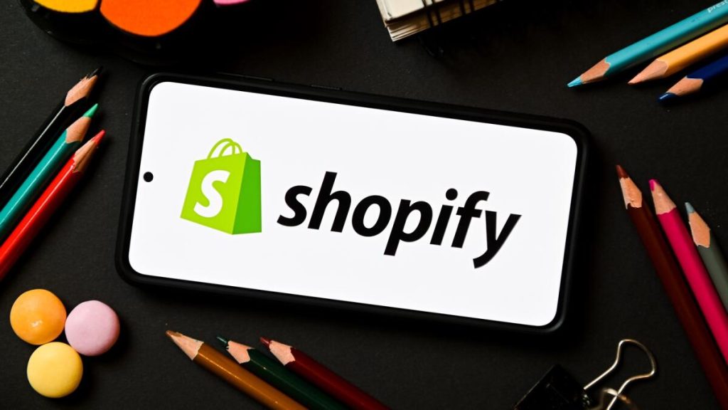 photo of phone with shopify ireland logo